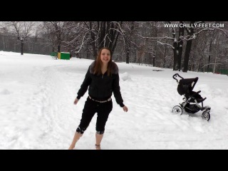 barefoot margarita in a snowy park. part 1/3.
