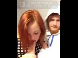 caucasian gives a fang to a redhead